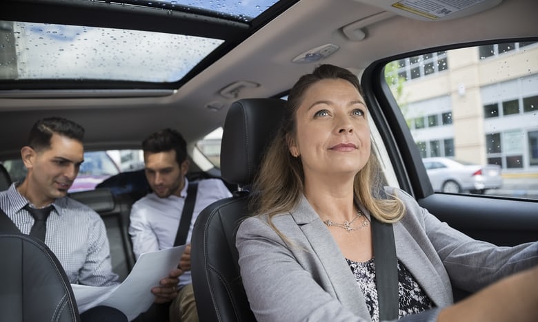 Business people carpooling. Photograph: Getty Images/Hero Images